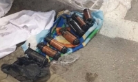 ضبط مركبة مقدسي وبداخلها 7 قنابل هلع في مخيم شعفاط