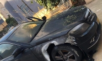 اضرام النار بسيارة معلم مدرسة والقاء قنابل صوت