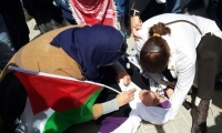 إصابة 32 سيدة في مواجهات على حاجز قلنديا خلال مسيرة يوم المرأة