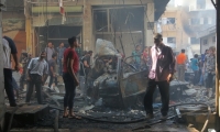مقتل 58 شخصا في هجوم جوي على سوق شعبي في إدلب