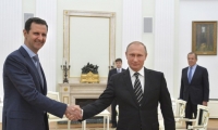 بوتين يطالب الأسد بالتنازل عن صلاحياته 